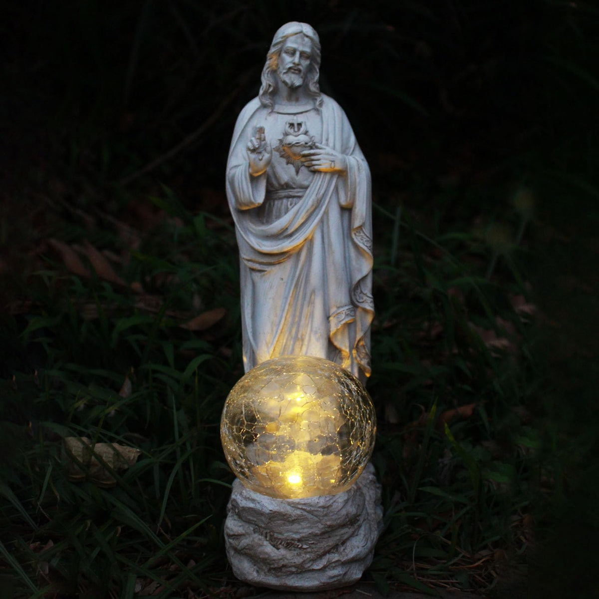 xxoasis front view of statue showing Sacred Heart and natural stone finish for devotional display
