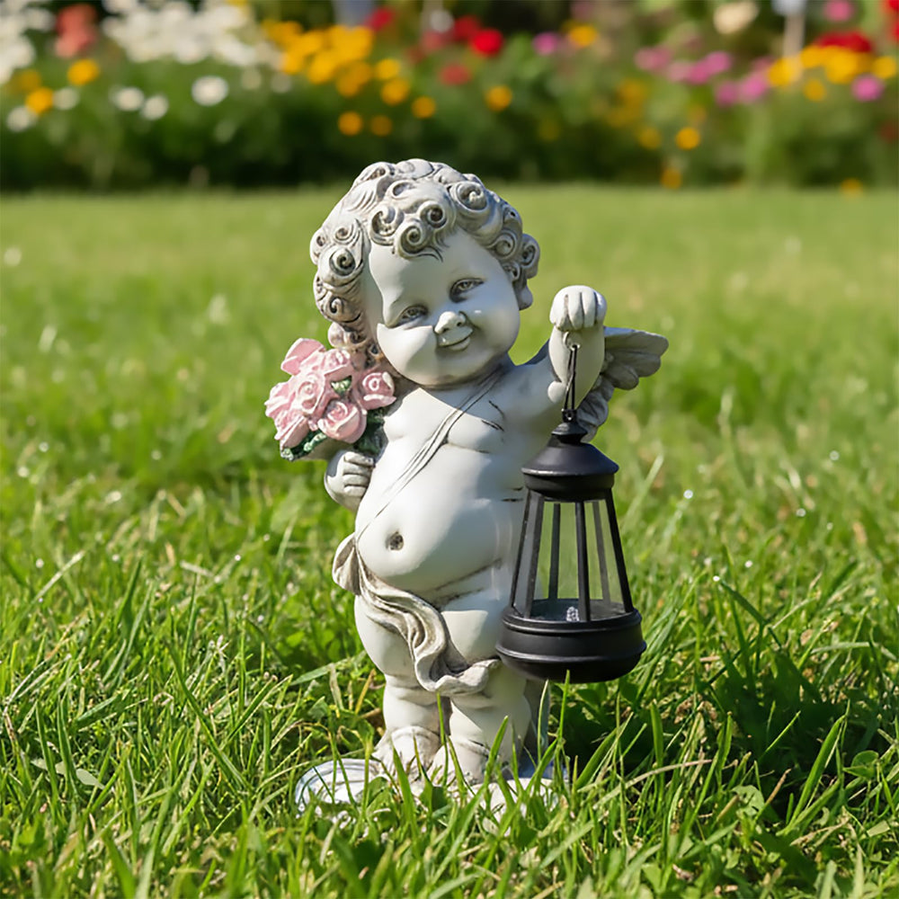 xxoasis angel lantern lit at dusk creating warm outdoor ambiance