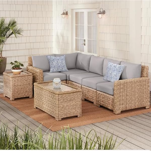 XXPILOS decorative pillows styled on an outdoor patio lounge adding comfortable color and weather-ready decor