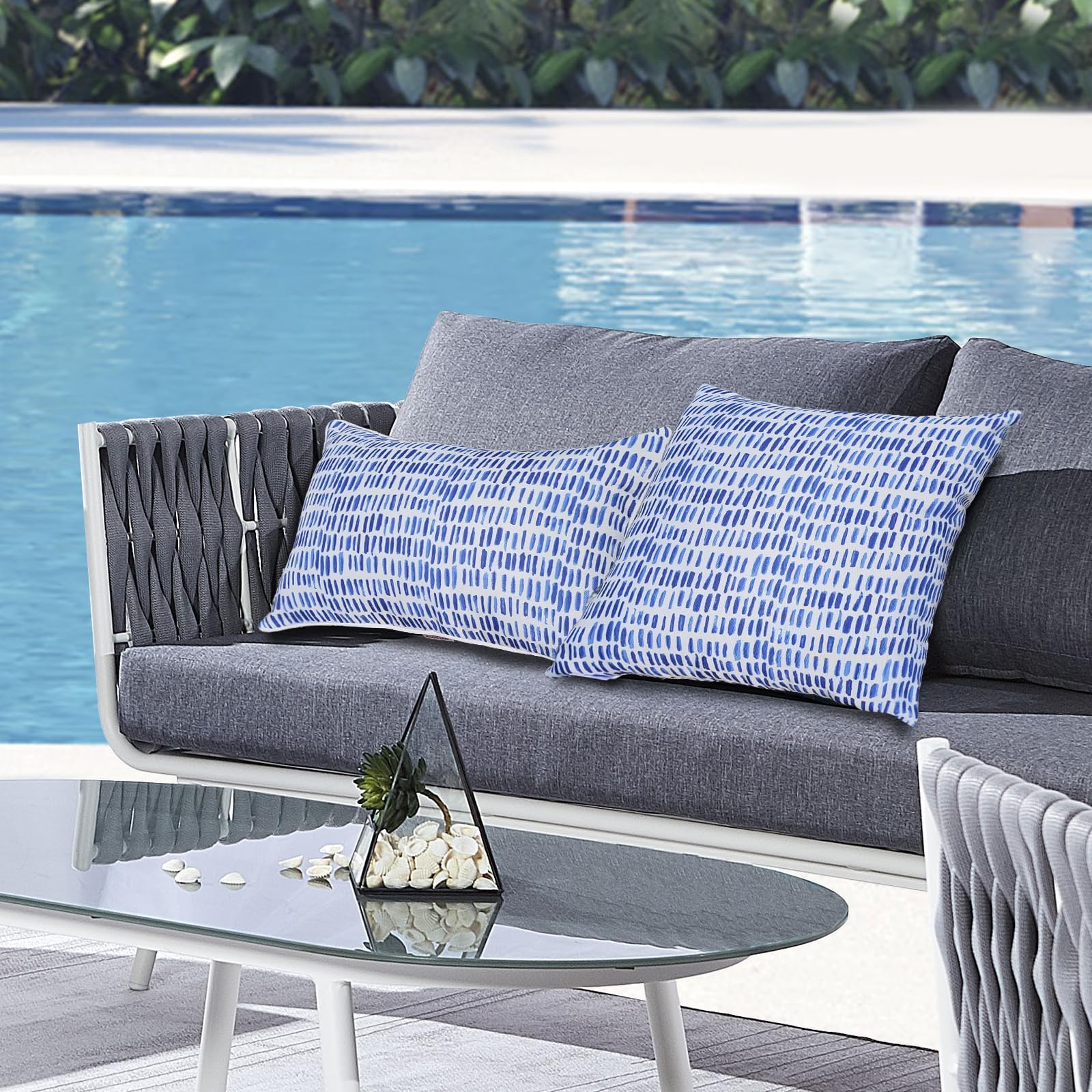 XXPILOS pillow next to a chair to show 18x18 inch scale for visual sizing and placement ideas