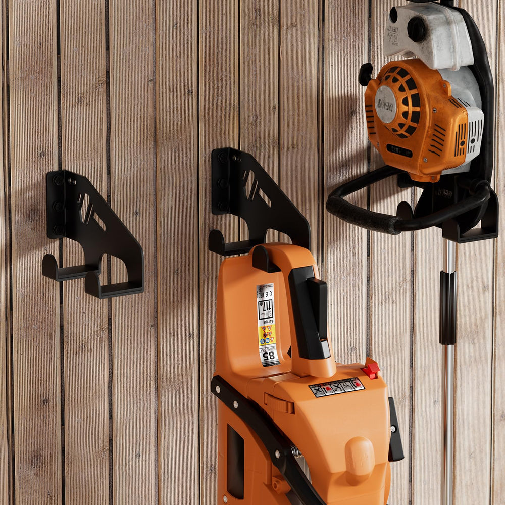 XZHXFX chainsaw hanger with screws and anchors demonstrating easy installation
