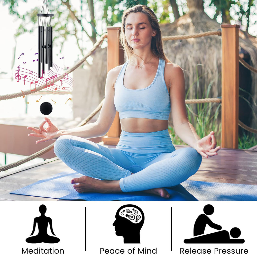Yahenda wind chimes hanging in garden providing tranquil outdoor ambiance