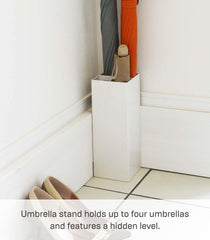 Yamazaki stand holding mixed full and folding umbrellas for organized entryway benefit