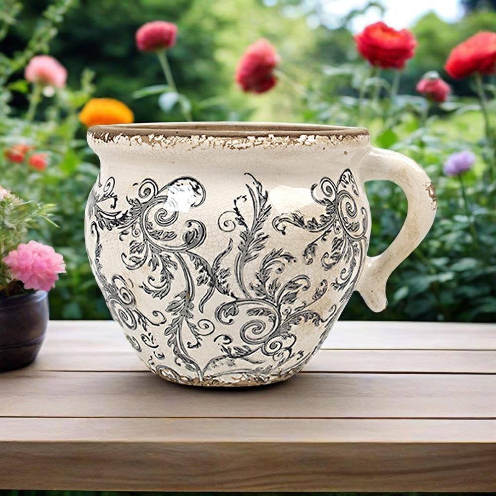 YANMILIA close-up of embossed floral pattern adding antique character