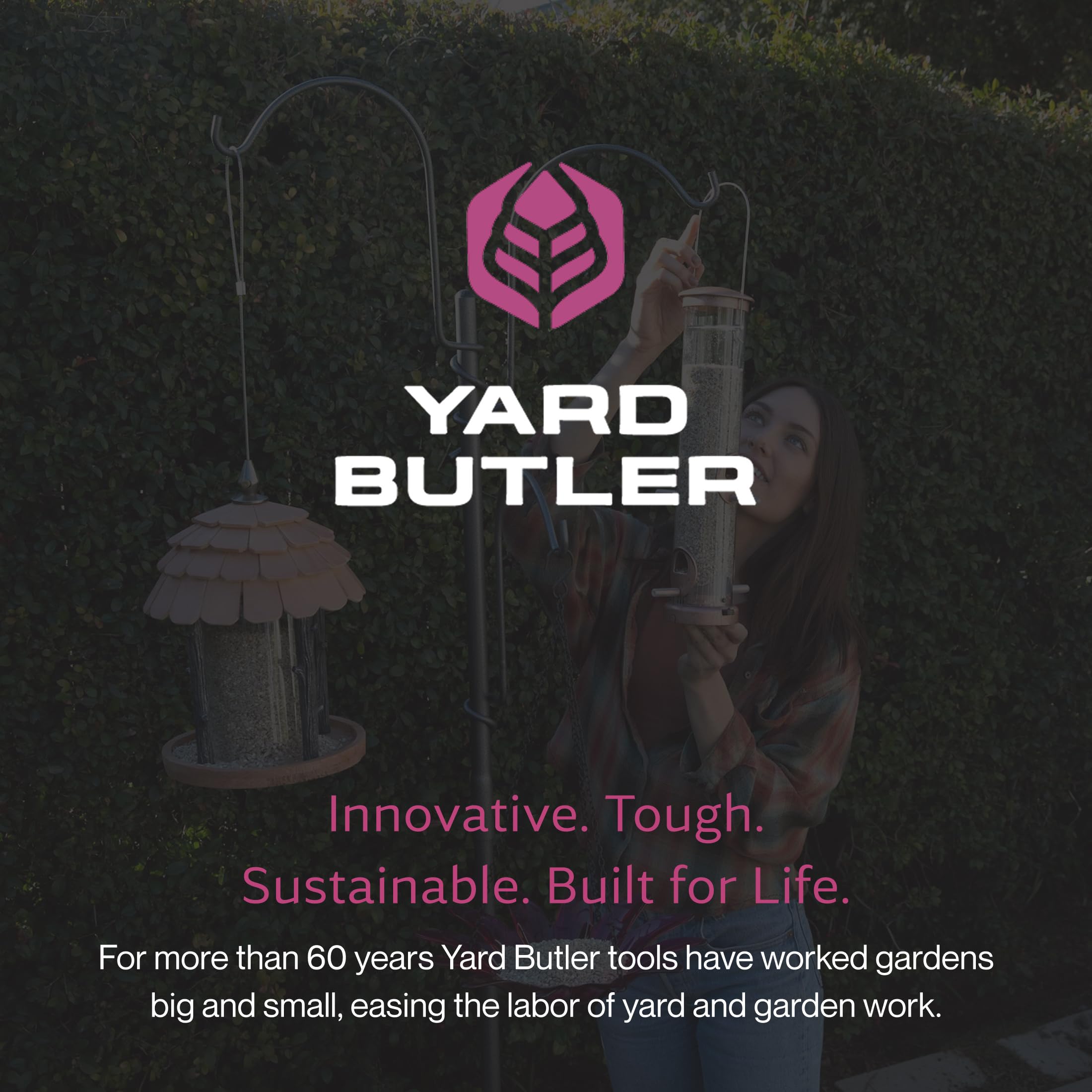 Yard Butler in garden with plants and feeders, enhances outdoor décor