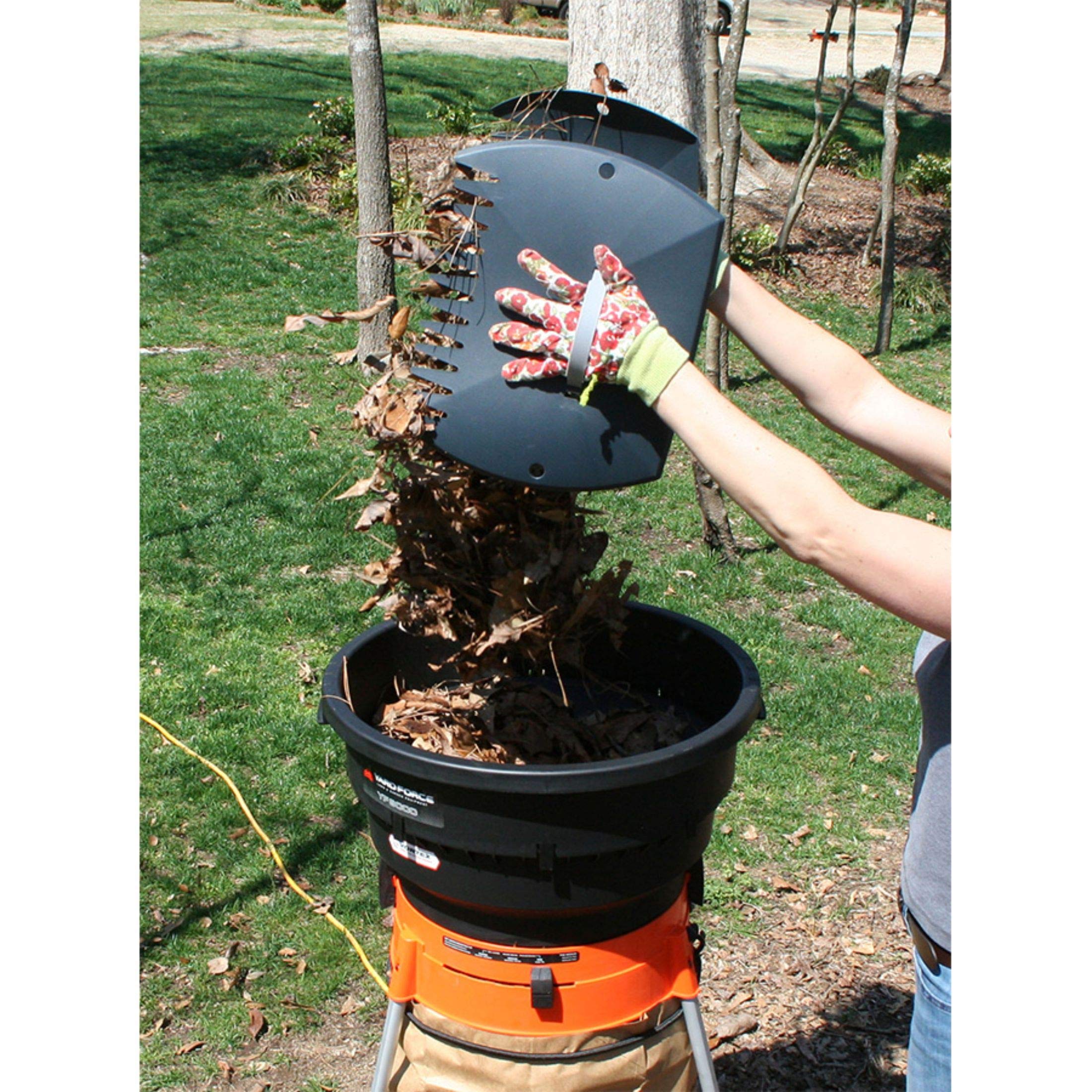 Yard Force accessory kit laid out with rake and replacement lines for quick start