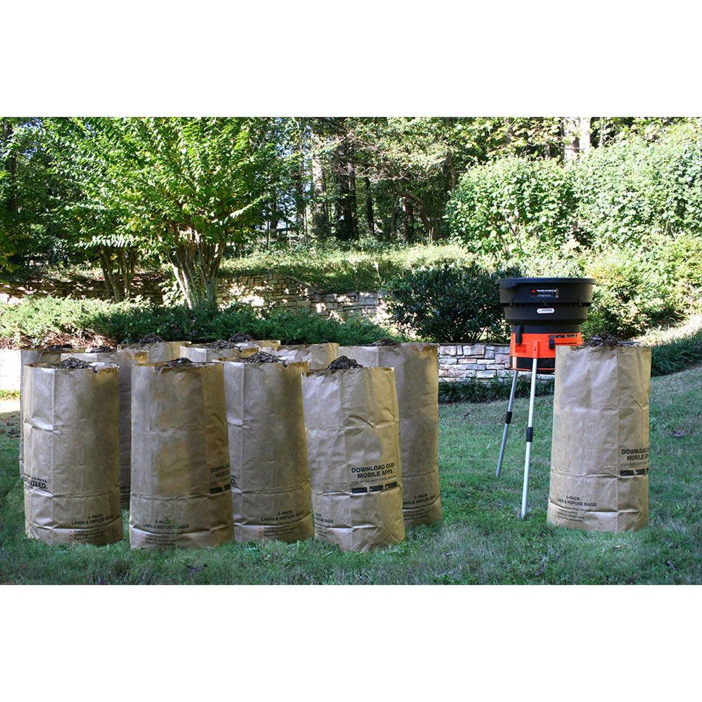 Yard Force mulcher shredding leaves outdoors demonstrating efficient mulching benefit