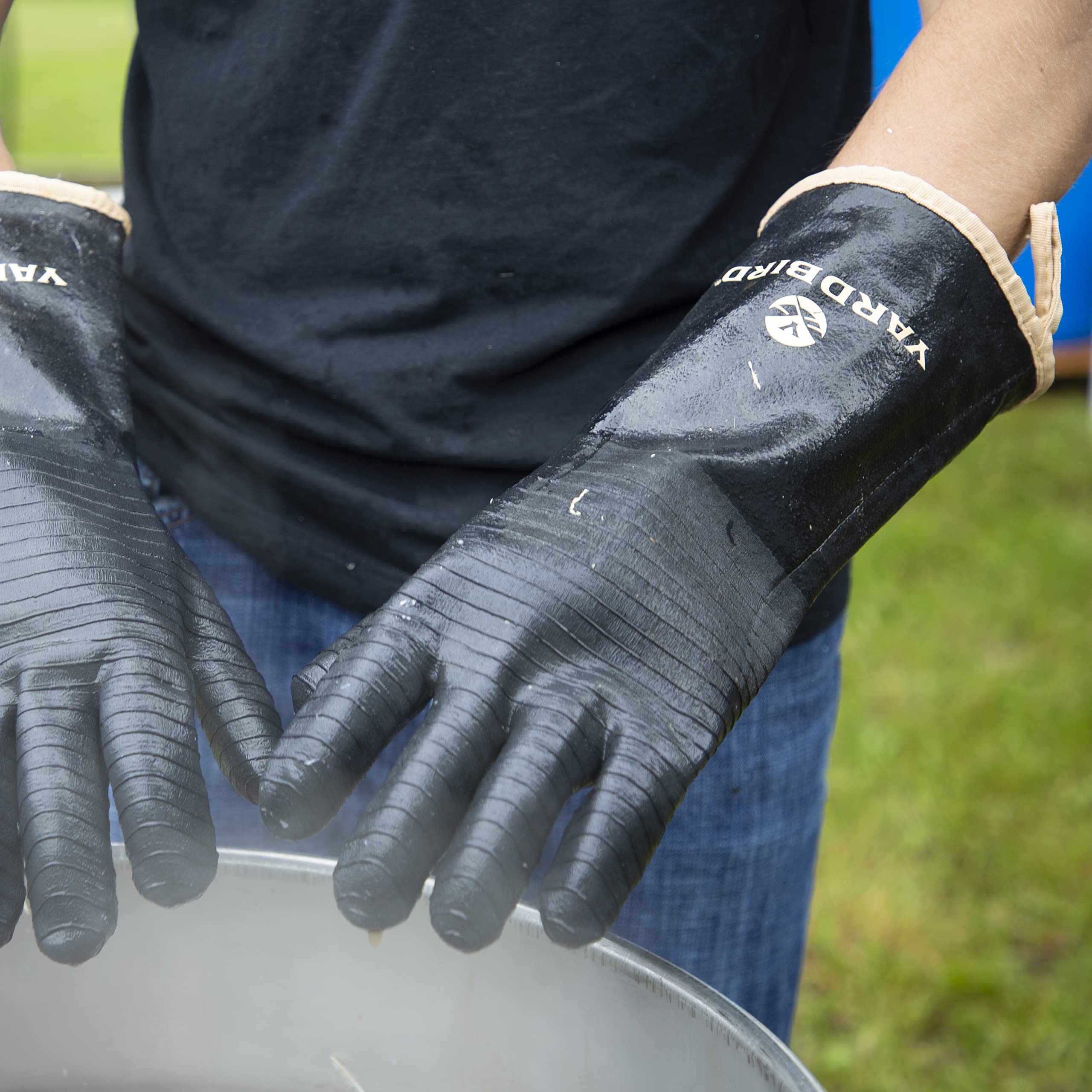 Yardbird gloves in use during poultry processing for secure handling