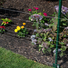 YARDGARD fence roll beside measuring tape showing size and scale advantage