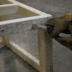 YARDGARD next to tape measure showing 24-inch height, easy sizing for projects