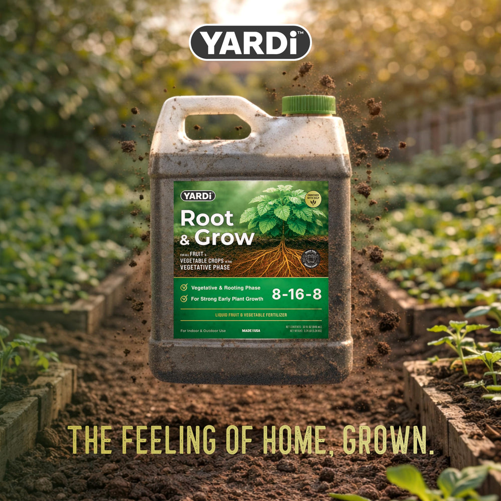 32 oz YARDi bottle held next to hand to show compact size and coverage