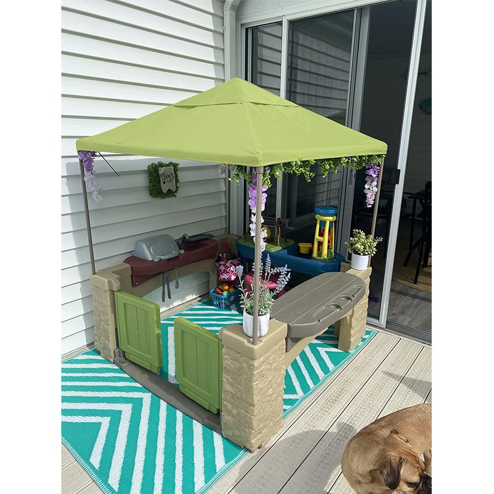 YardJoyliz canopy on a backyard playhouse creating shaded, kid-friendly outdoor play space