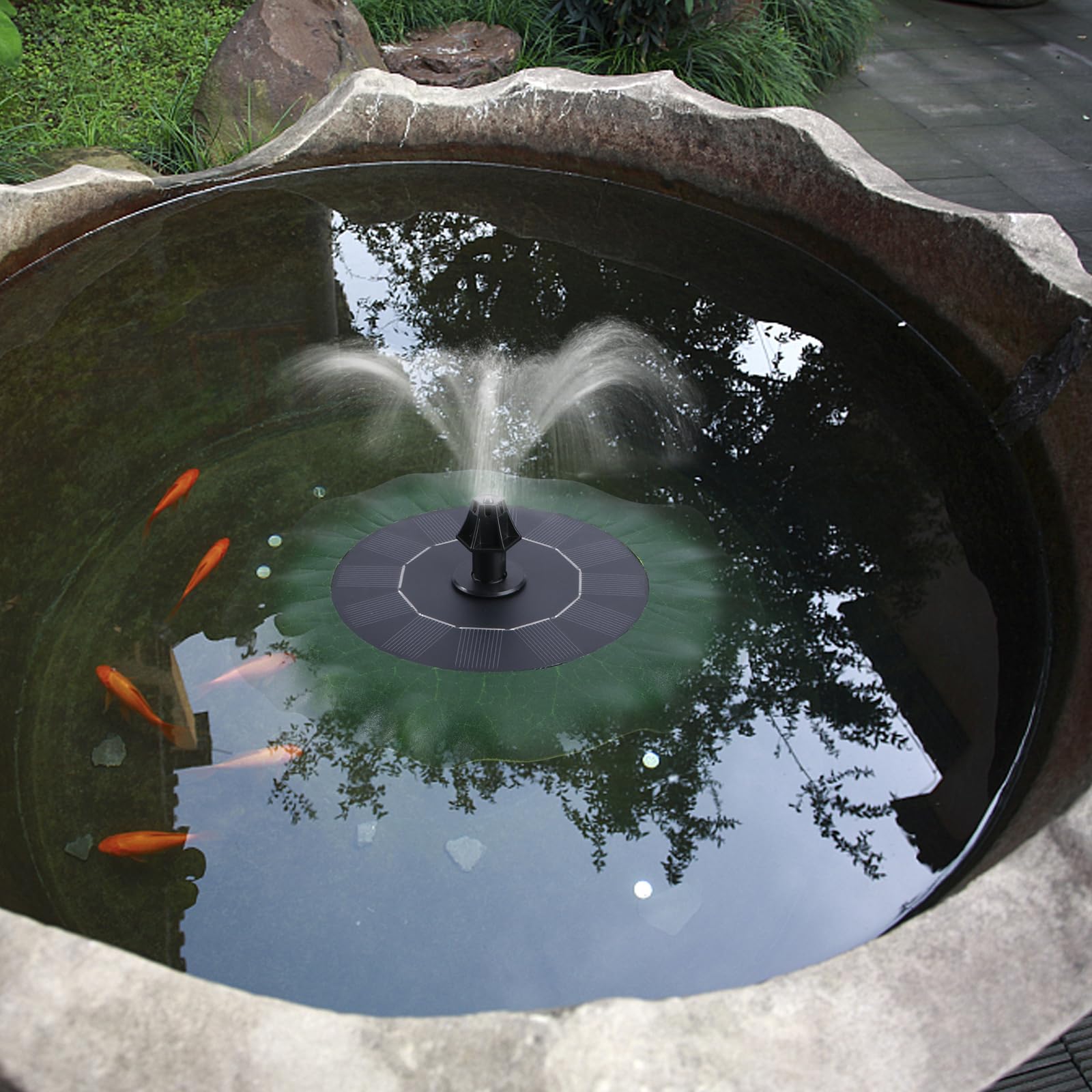 YARNOW backyard lifestyle shot adding ambiance to patio water feature