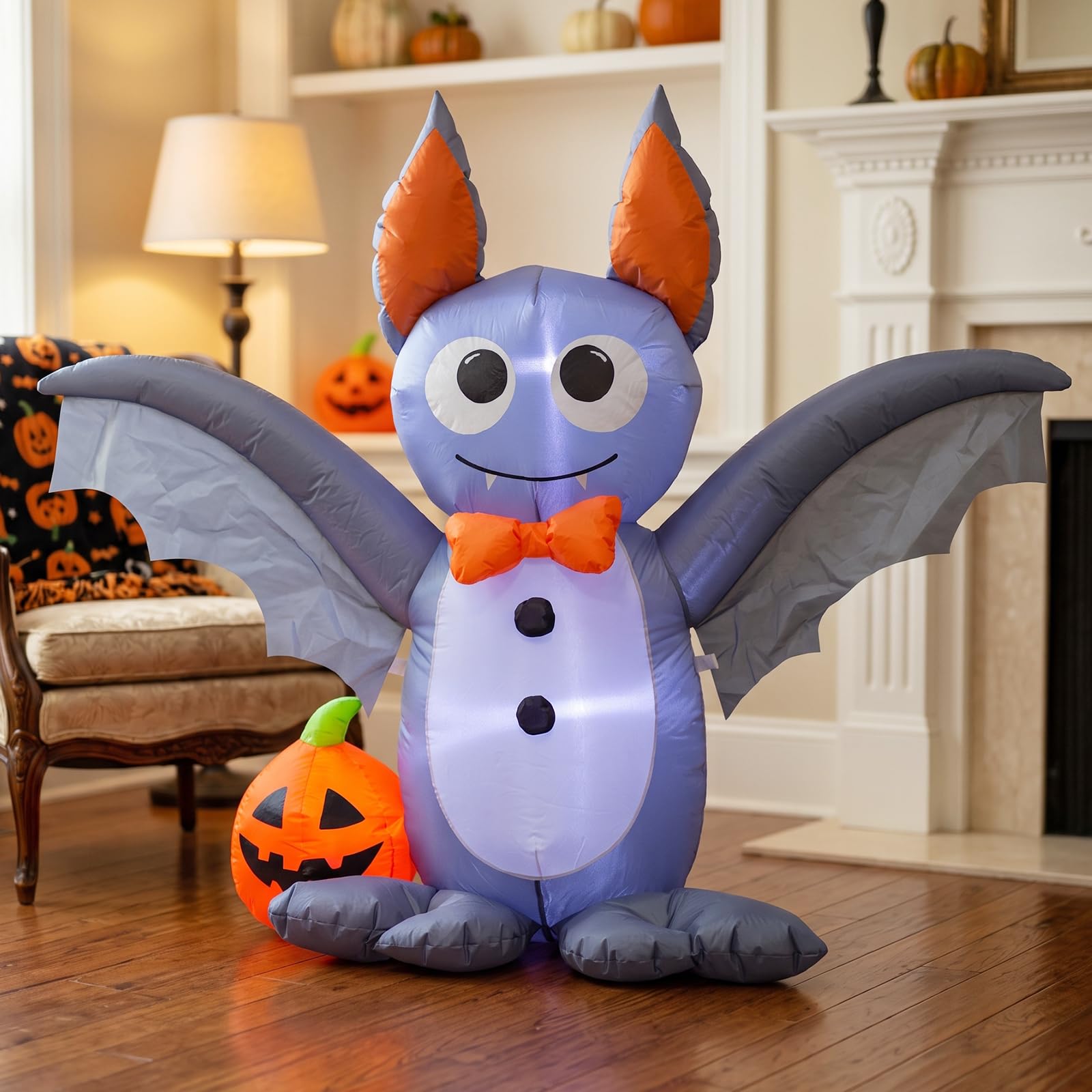Ycolnaefllr bat lit in a front yard at night creating an inviting Halloween atmosphere benefit