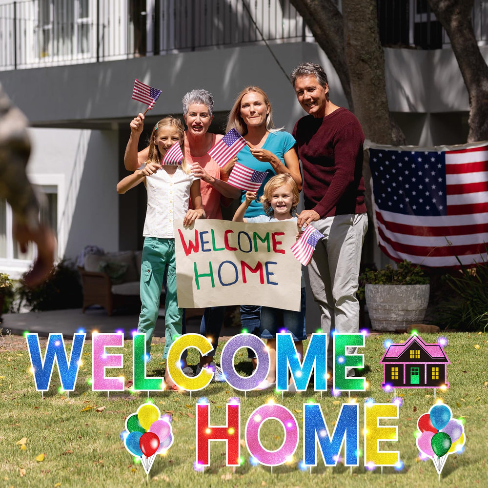 Yerliker installed welcome home signs on a front lawn creating festive curb appeal