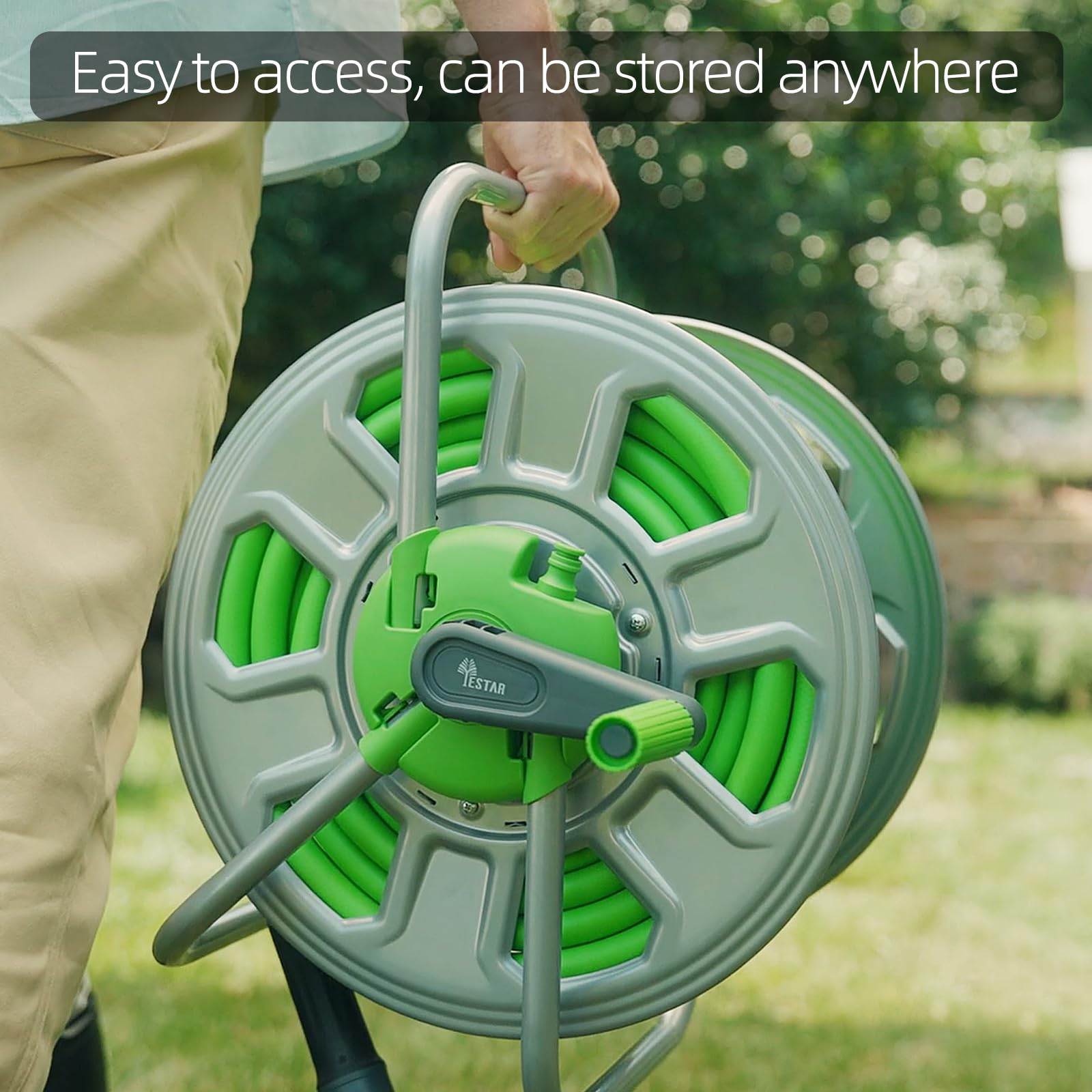 YESTAR hose reel beside a foot for scale showing compact portable size