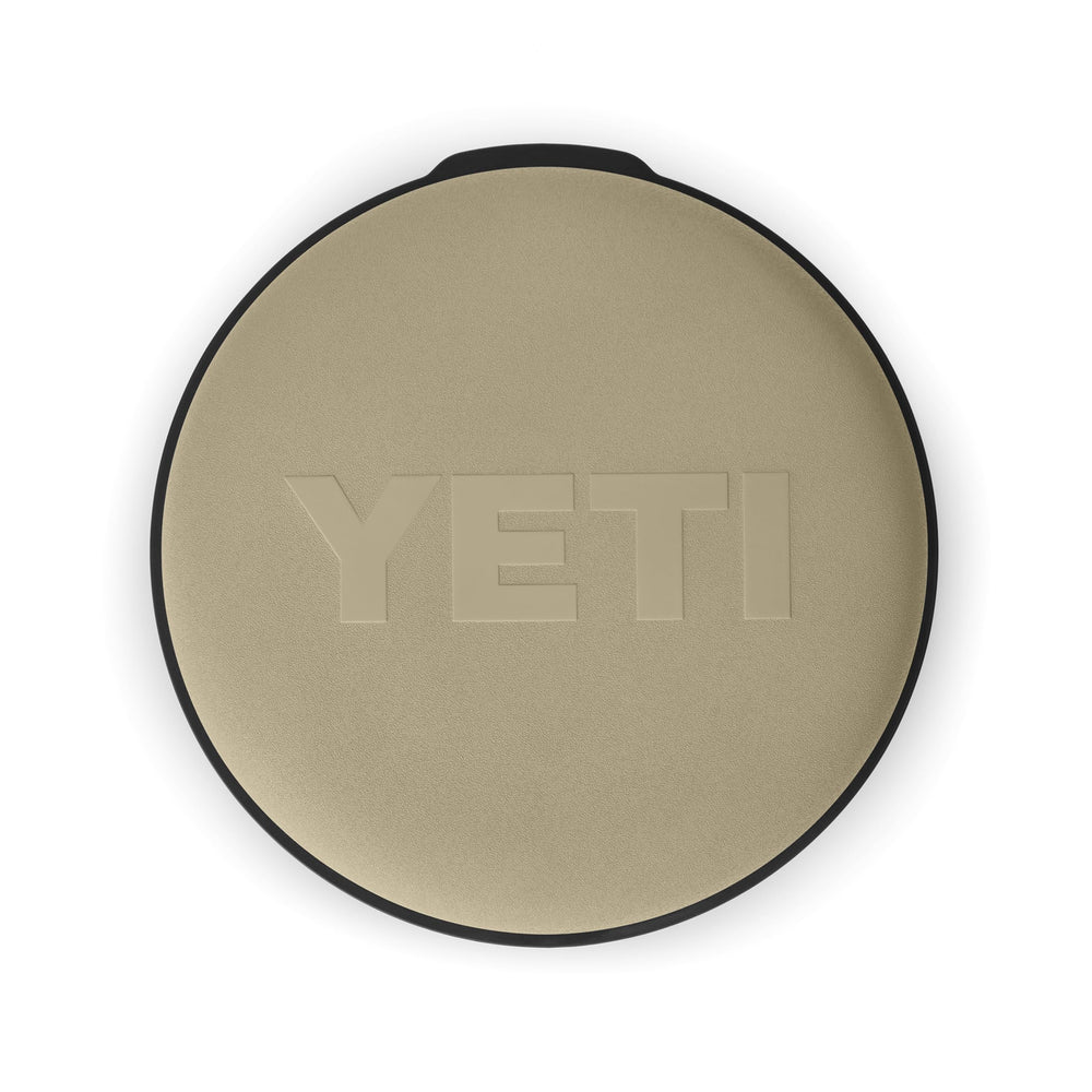 YETI seat in use on a fishing pier illustrating comfortable perch and organized tackle storage