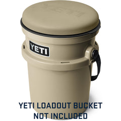 YETI seat hooked on bucket side so tools stay accessible and seat stays clean during activity
