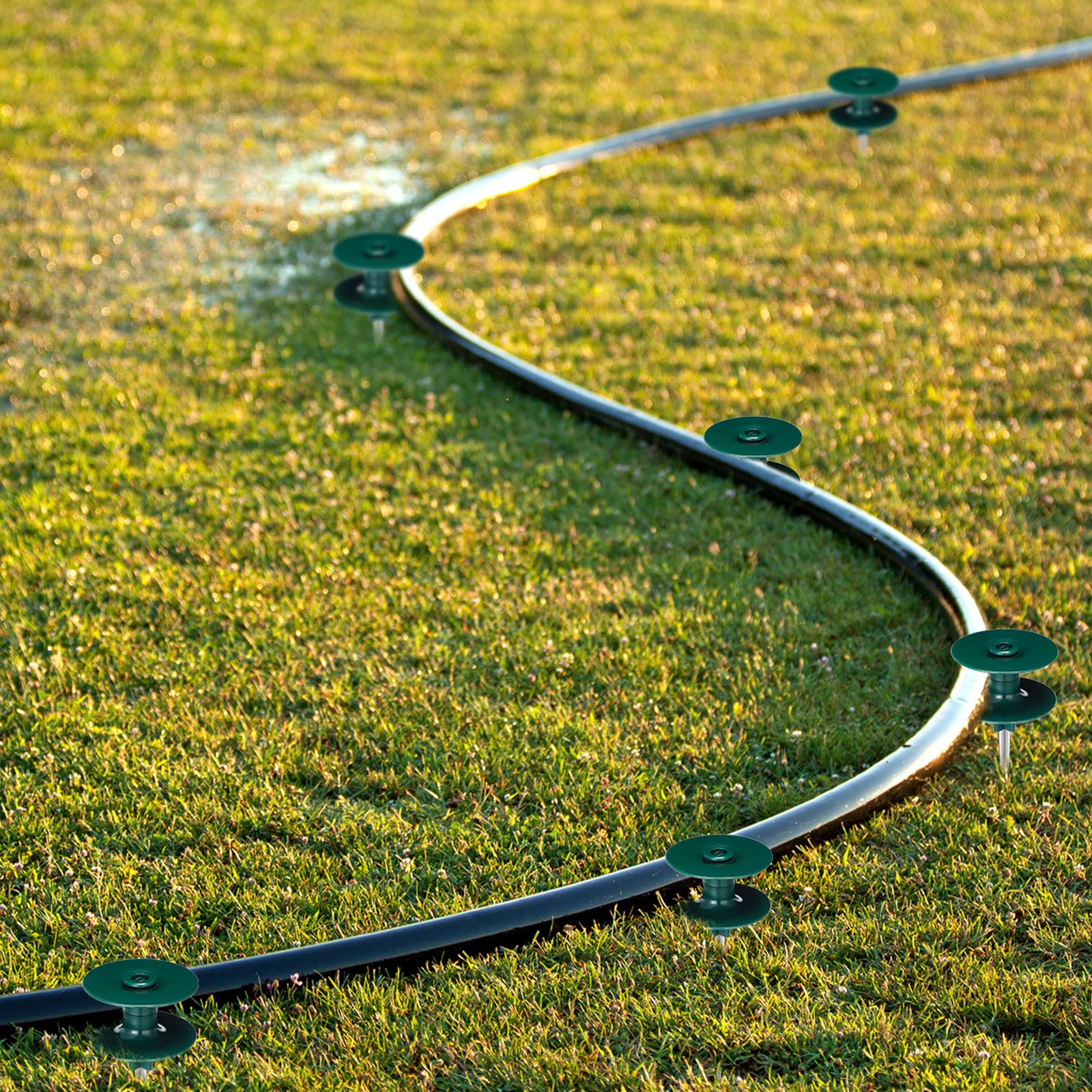 Yexiya row of guides in flower bed organizing hoses and preventing damage