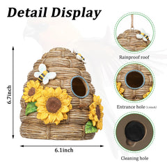 Yinns bird house hung on a tree attracting small birds up close