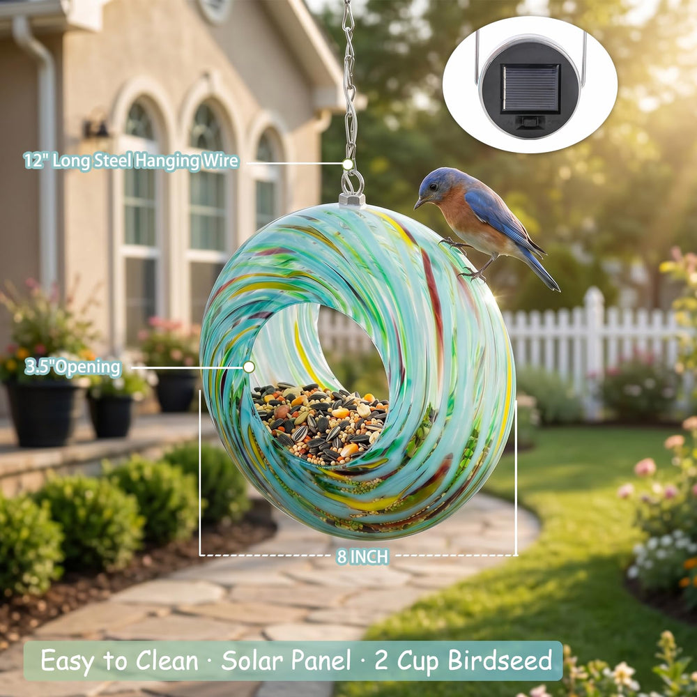 Yinns solar light glowing at dusk on feeder to extend visibility and charm