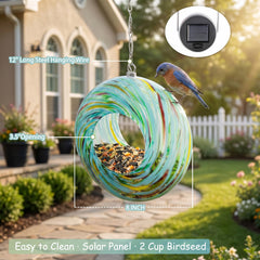 Yinns solar light glowing at dusk on feeder to extend visibility and charm