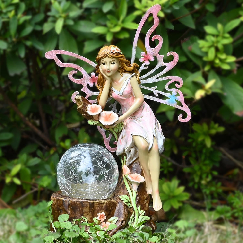 Yiosax fairy statue front view showing colorful figure and solar light benefit