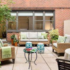 YNGFIL table in use on bistro balcony holding drinks and snacks for convenience