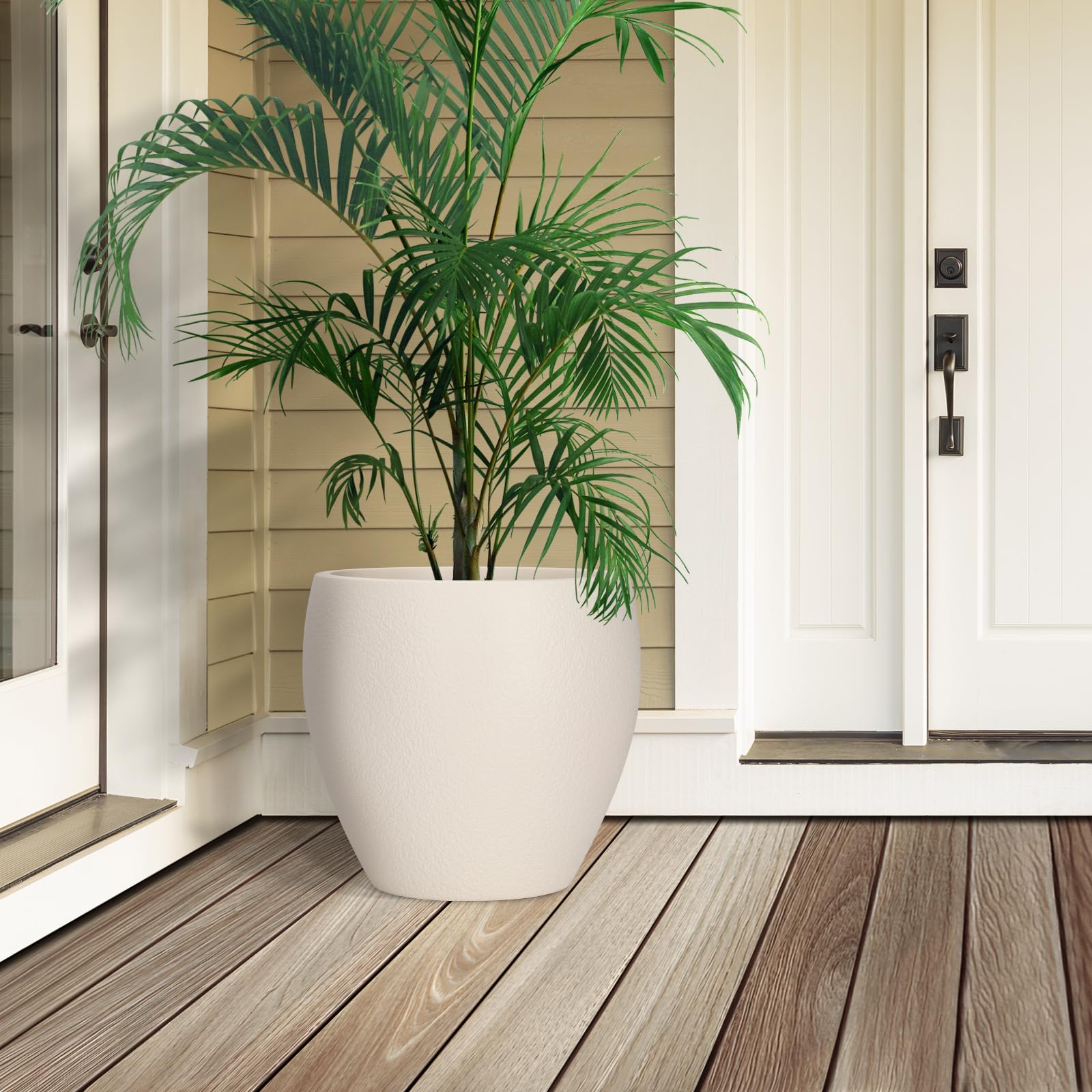 YNNICO planters staged on a patio filled with greenery demonstrating attractive display