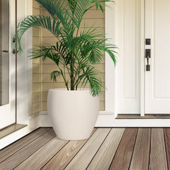 YNNICO planters staged on a patio filled with greenery demonstrating attractive display