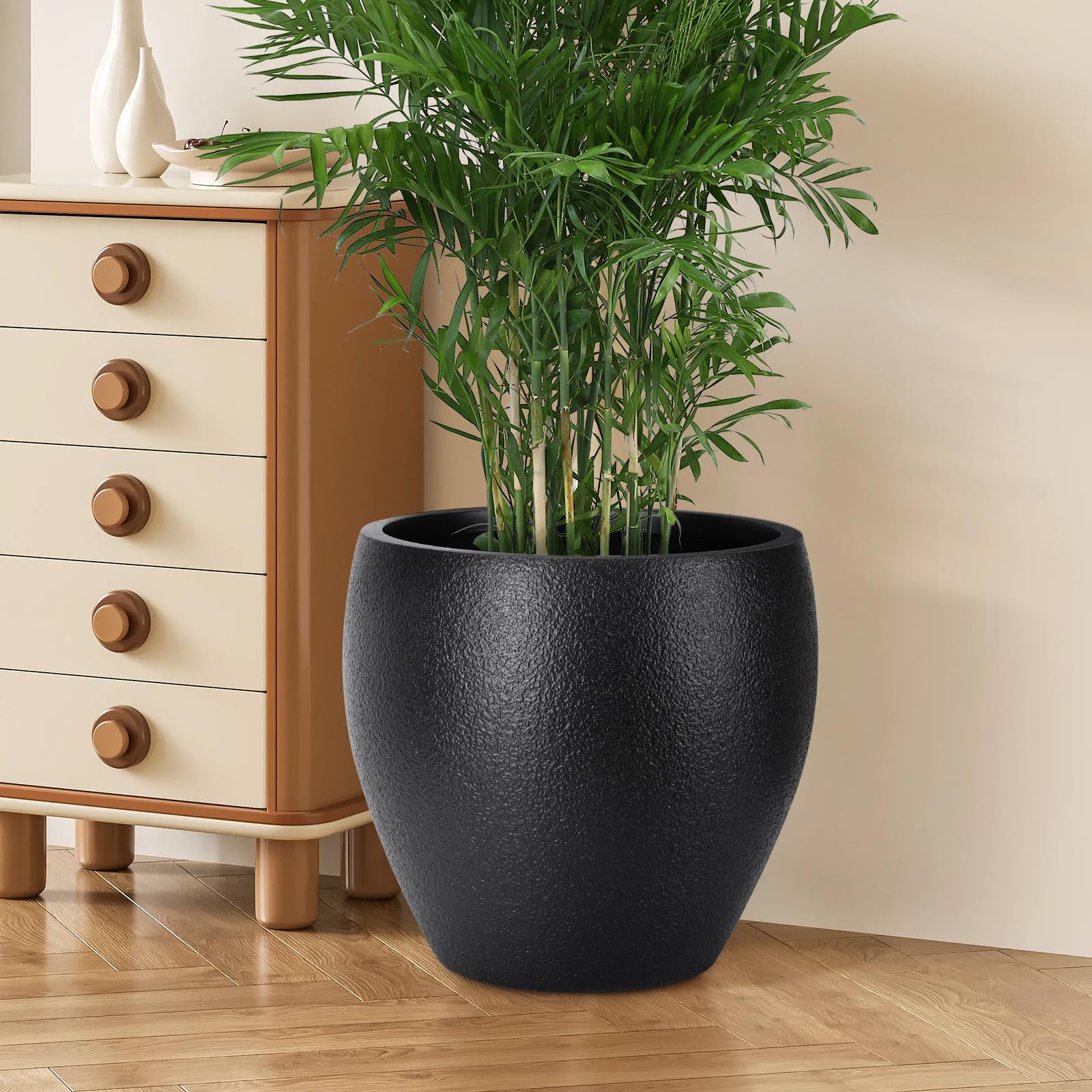 YNNICO planters with leafy plants on a porch providing attractive curb appeal