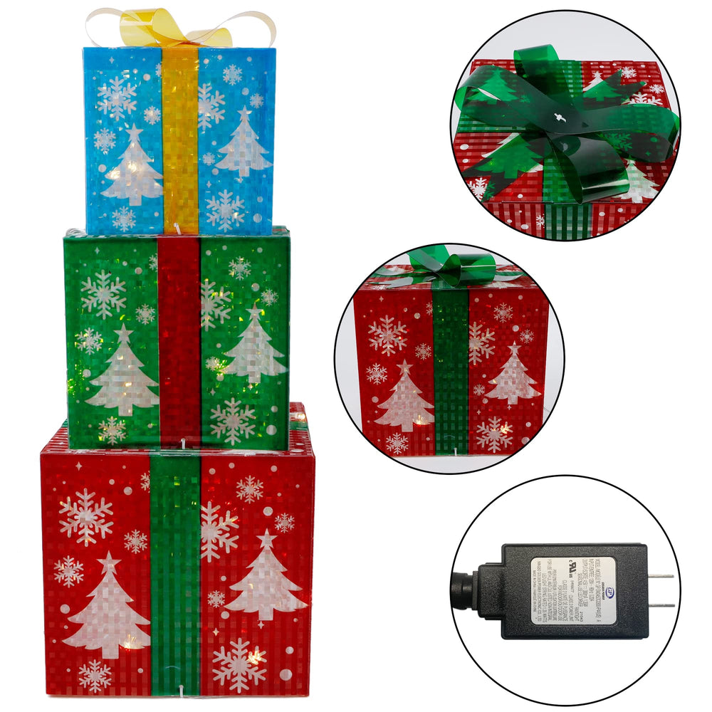 YOFIT lit present beside Christmas tree adding warm ambient lighting