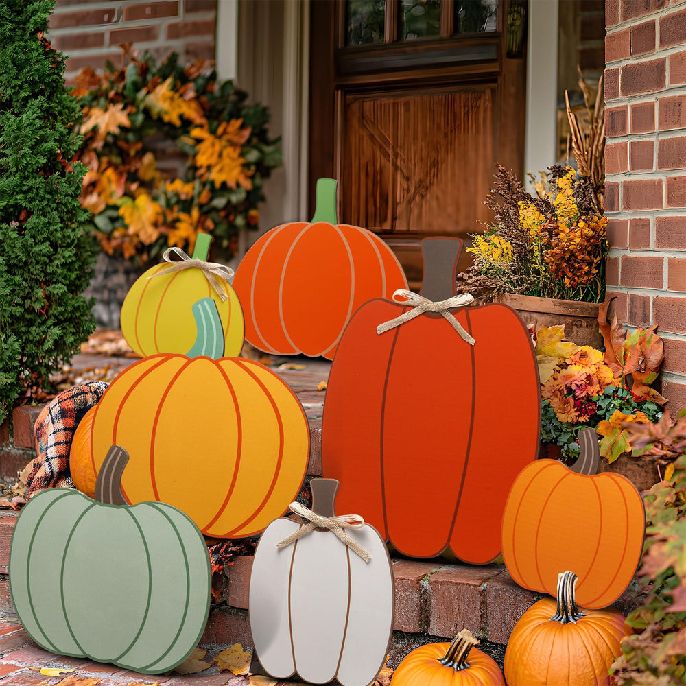 Yookeer pumpkins arranged on a porch creating instant autumn curb appeal