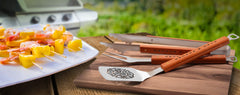 YouTheFan tongs close-up handle with brass rivets for secure grip and lasting durability