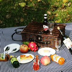 YPshuye plates and stainless flatware arranged inside basket for easy serving