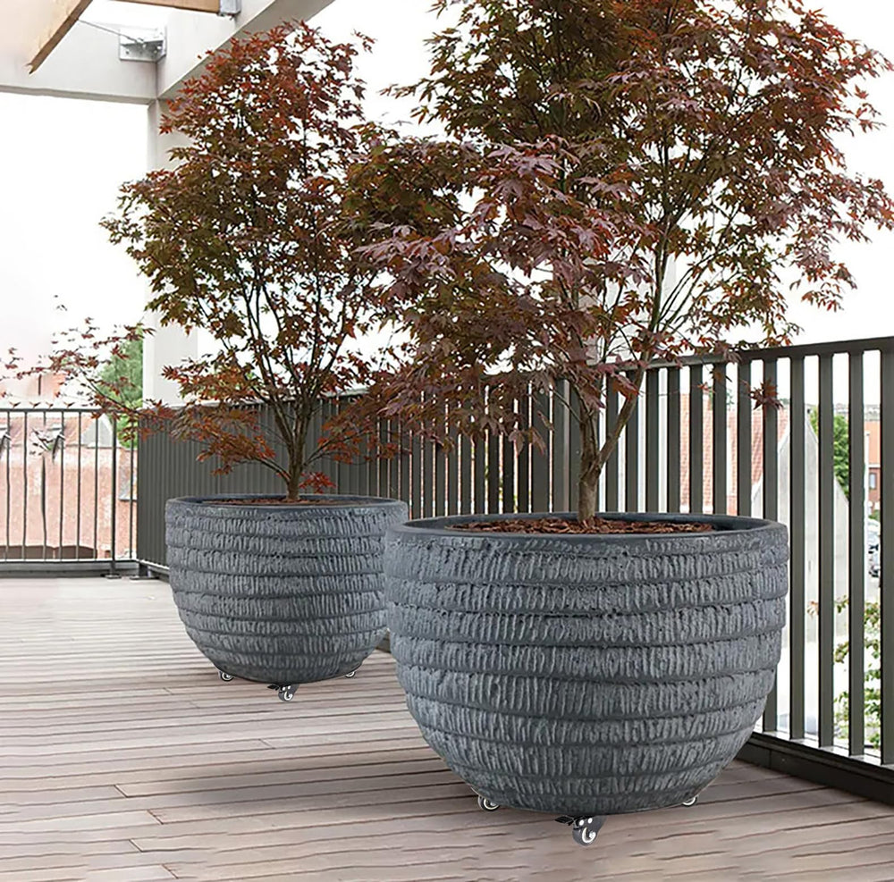 YUjieSTC under-pot demonstration with round planter centered for balanced weight distribution