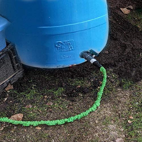 Yummiman barb adapters with flexible tubing showing secure fit for irrigation lines