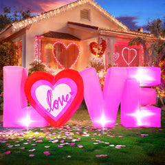 Zeepair front view of 7FT LOVE inflatable showing bold pink letters and heart, eye-catching focal point