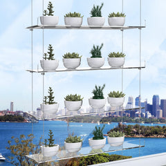 ZerzSemp front view of 4-tier acrylic shelf showing clean display and space saving