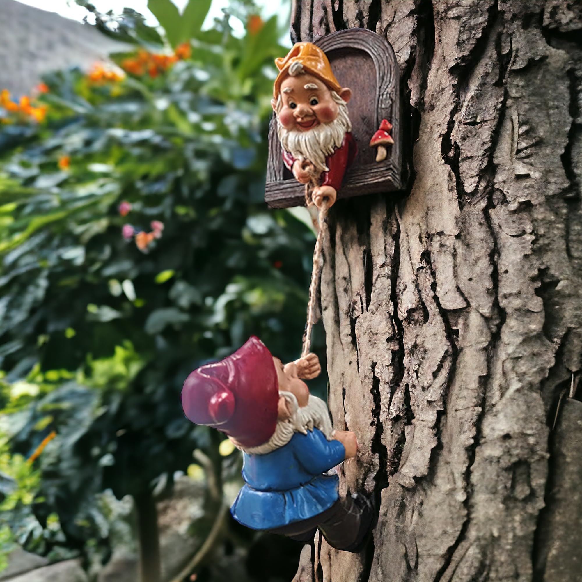 ZEshops gnomes staged in a flowerbed adding storybook curb appeal