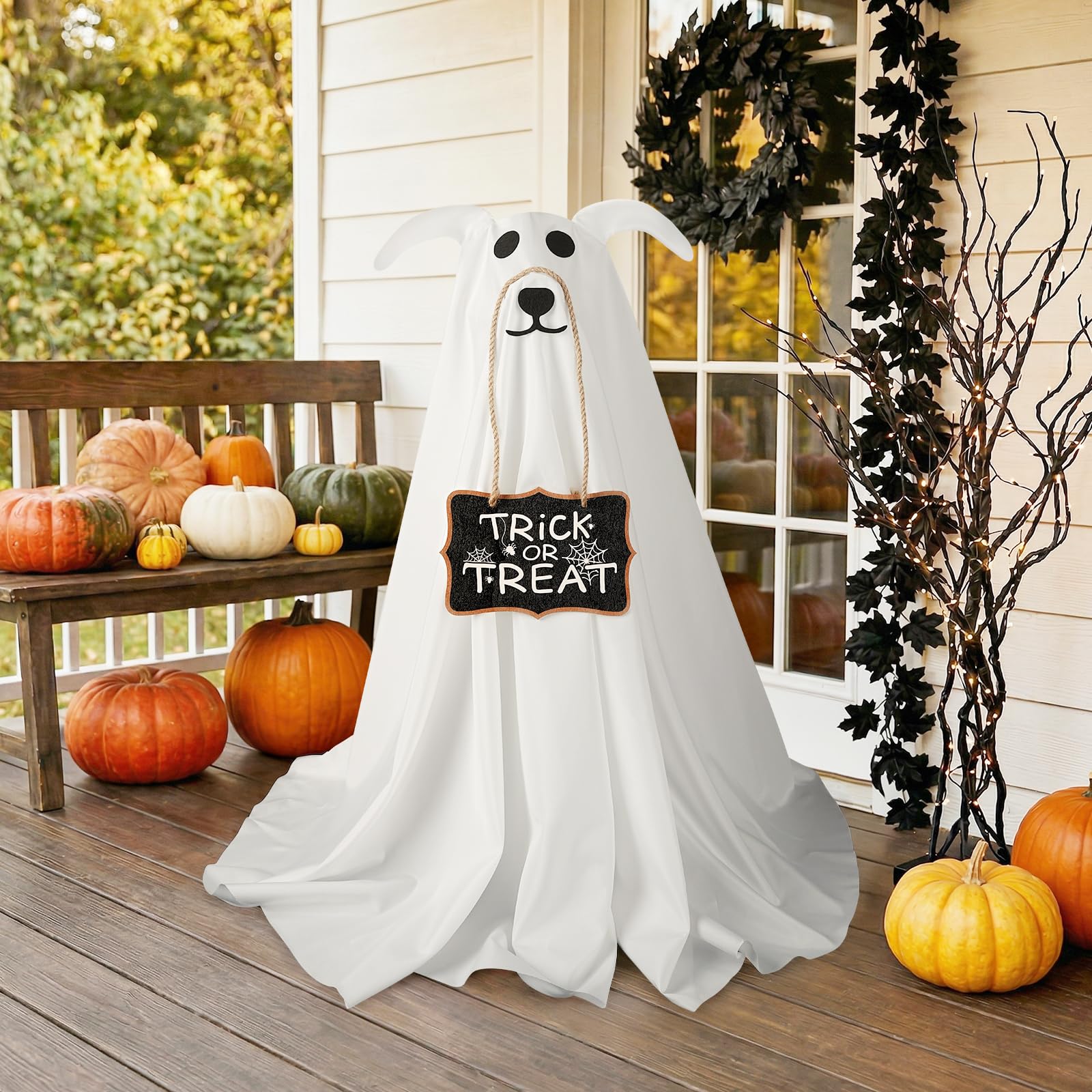 Zesua lit ghost dogs on porch showing warm glow ambiance
