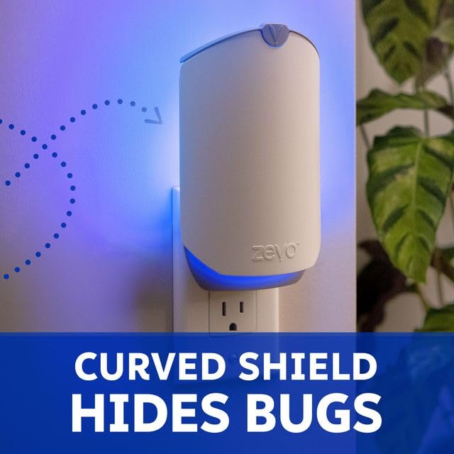 ZEVO placed in living room near plants demonstrating discreet indoor pest control