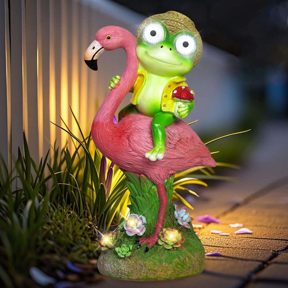 ZFNN front view of frog riding flamingo, playful garden accent and lighting