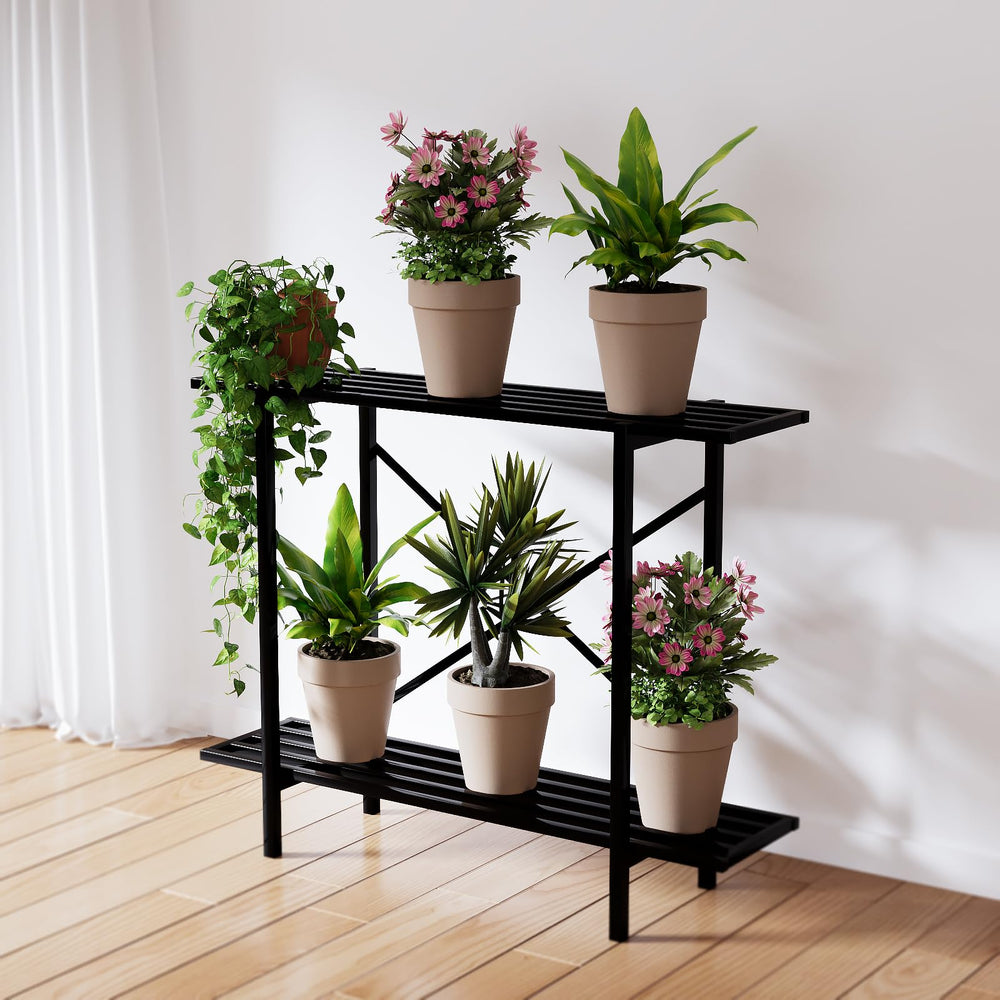 Zhongma plant stand on a balcony holding multiple heavy pots