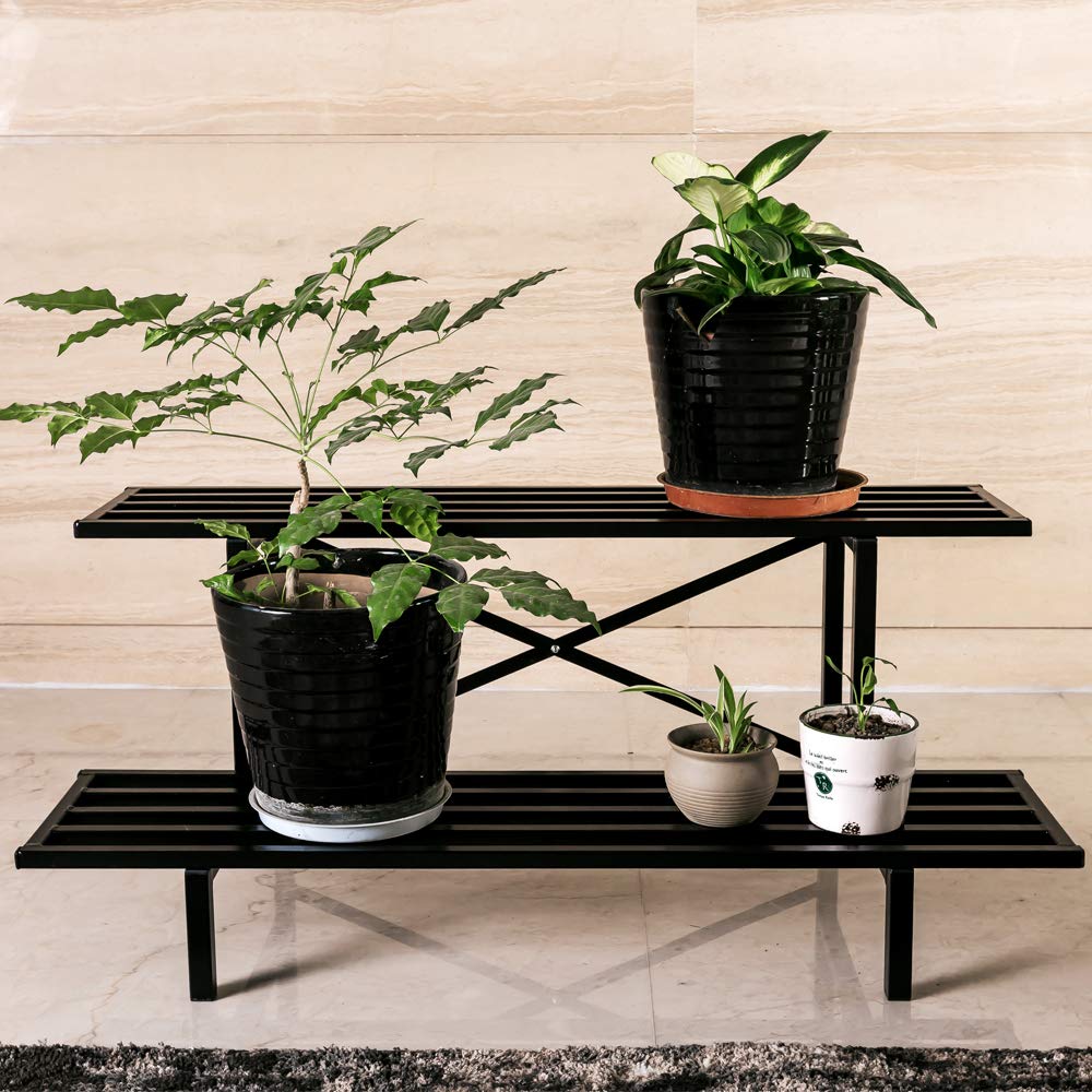 Zhongma plant stand in use with pots showing organized display benefit