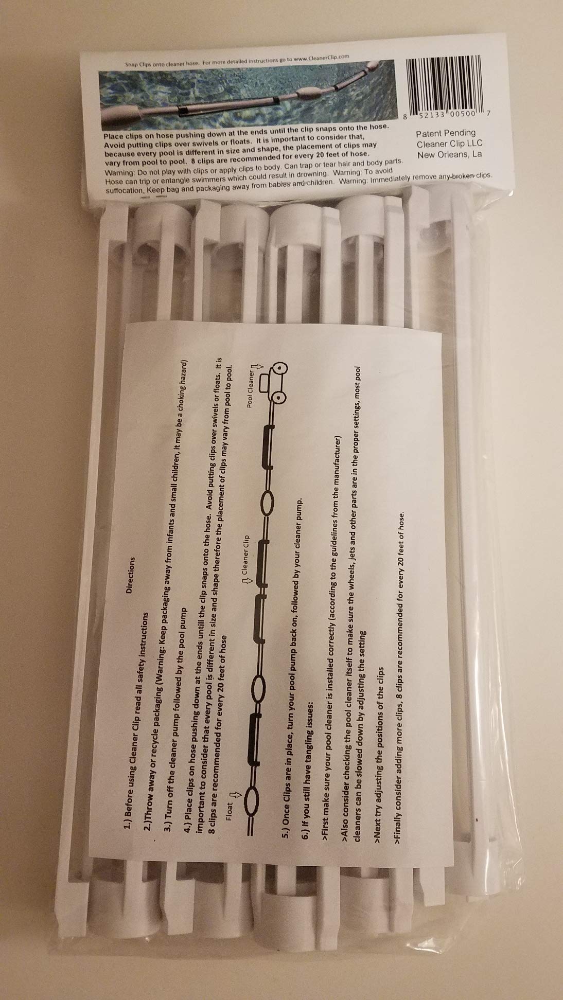 Zodiac Cleaner Clip ten clips lined up, illustrates recommended spacing and coverage