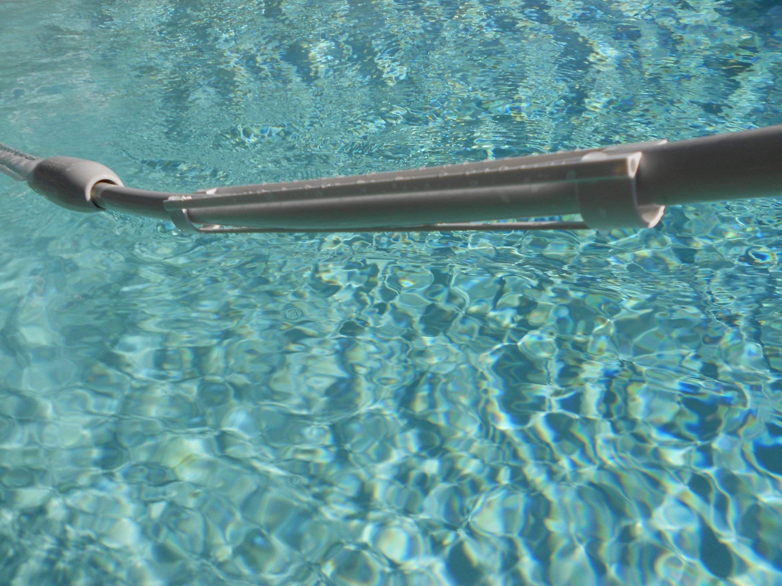 Zodiac Cleaner Clip close-up on snap mechanism, demonstrates secure fasten and durability