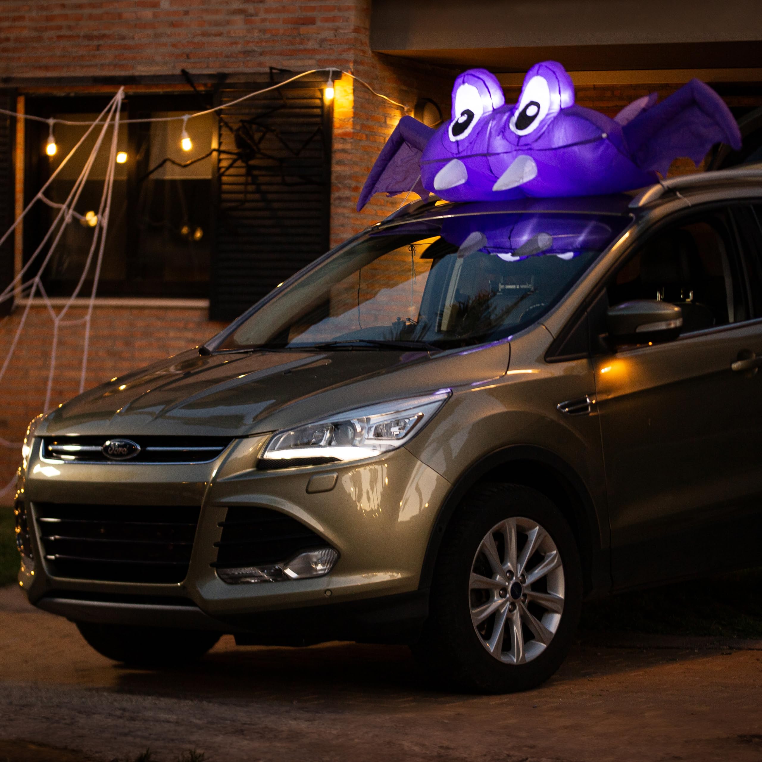 ZONETECH bat car at night on street showing illuminated curb appeal