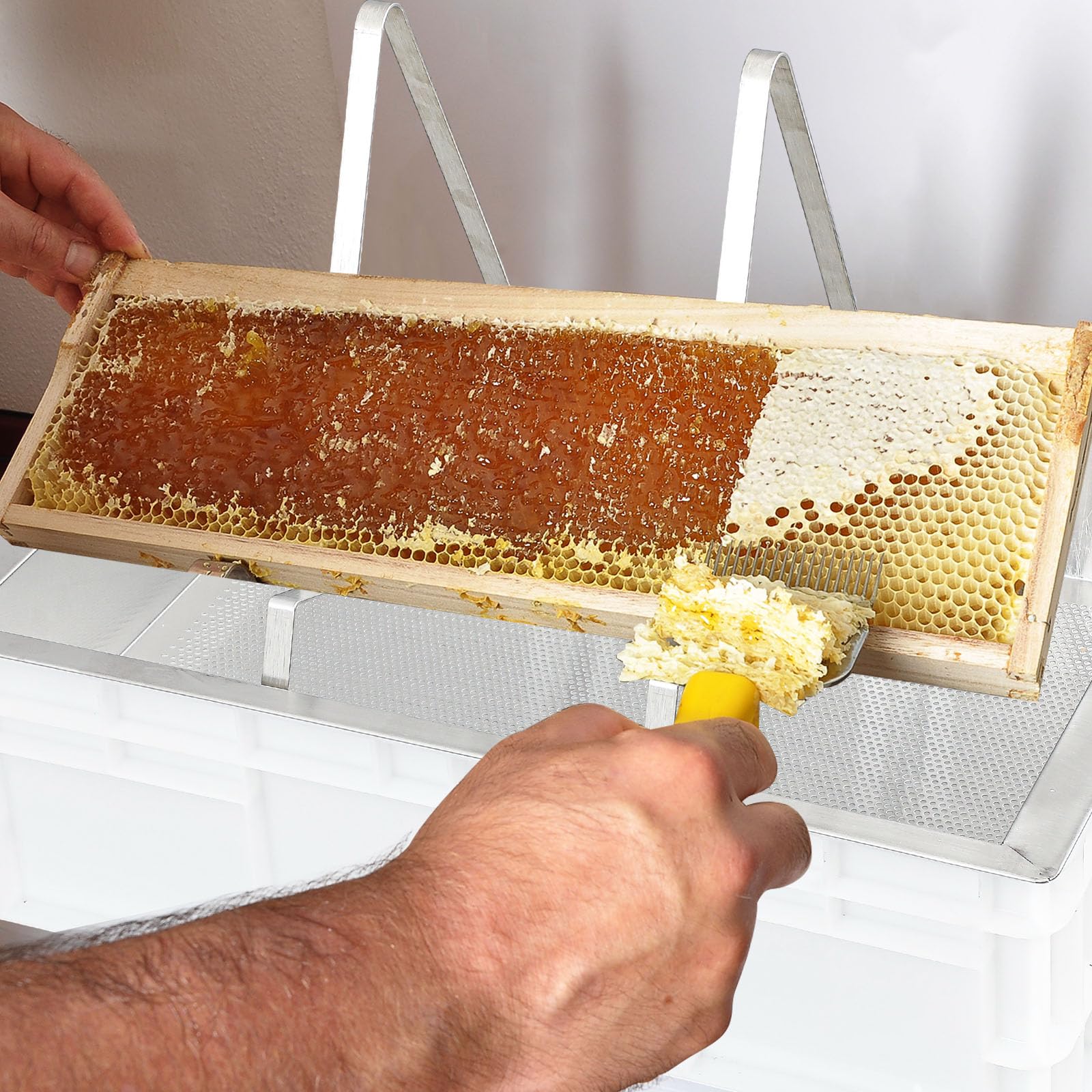 Zonon uncapping station in field use at an apiary for mobile harvesting efficiency