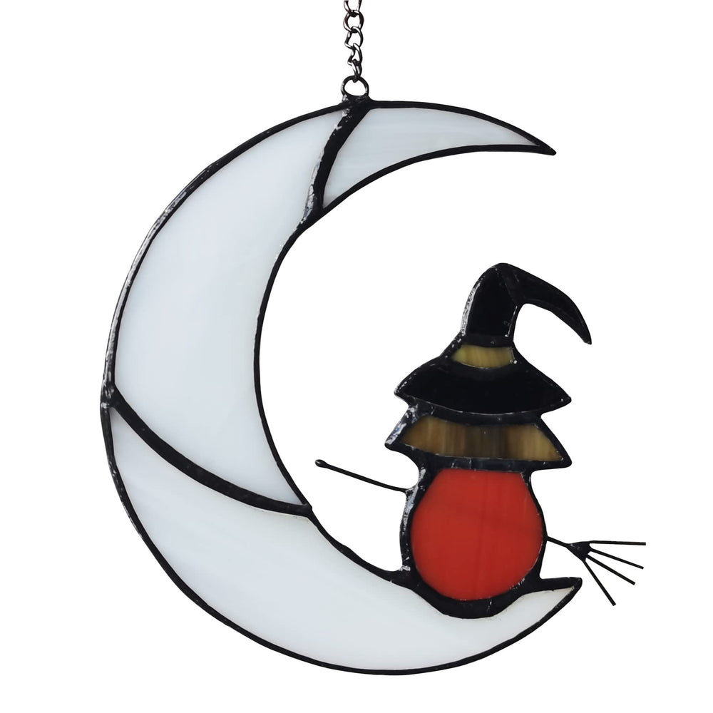 ZUAJITER front view of witch on moon suncatcher showing colorful stained glass highlights